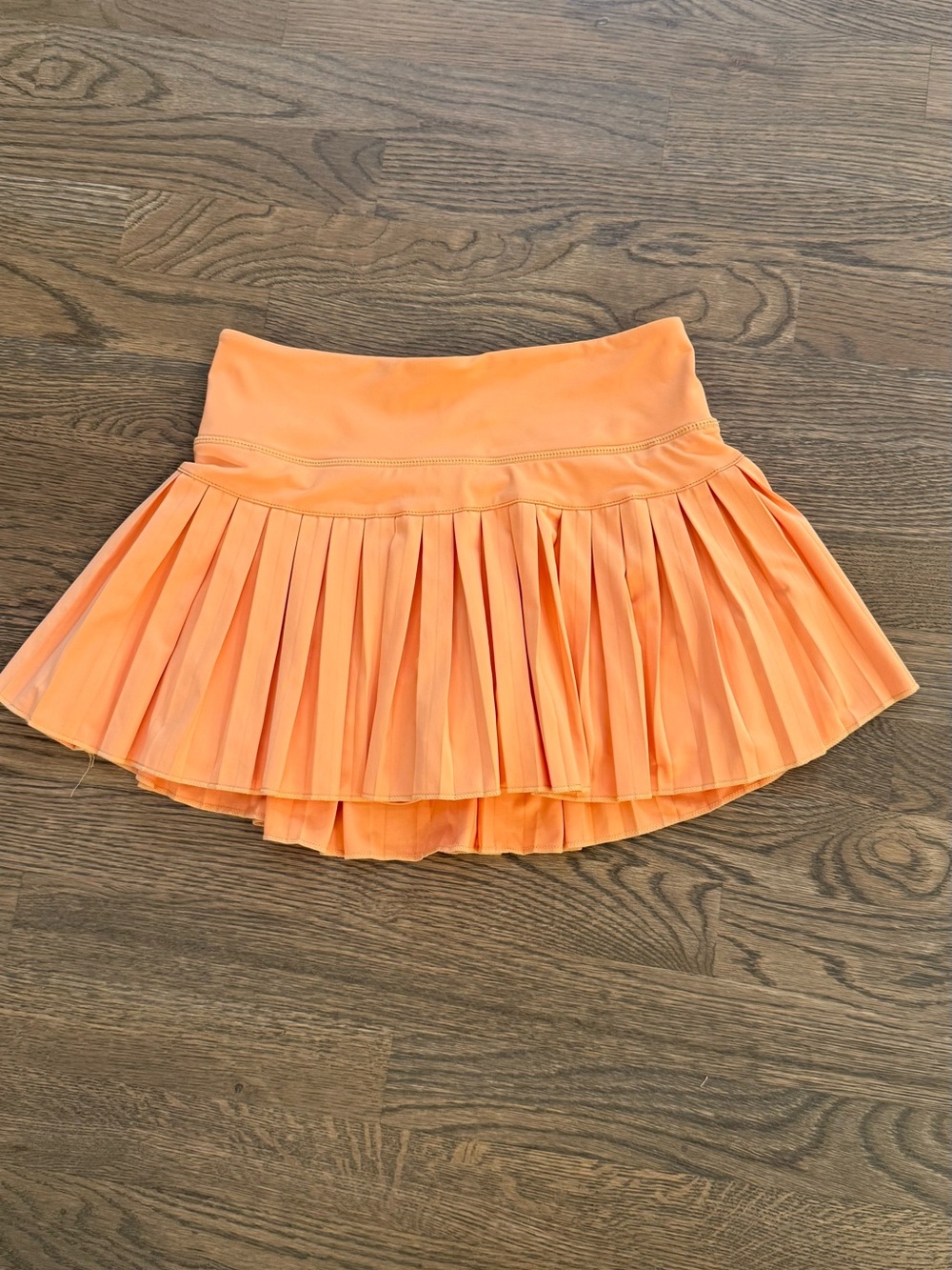 GoldHinge Orange Pleated Athletic Skirt